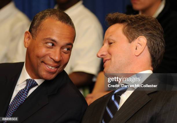 United States Treasury Secretary Timothy Geithner speaks with Massachusetts Governor Deval Patrick prior to announcing the national recipients of...