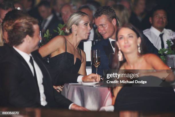 Bec Cartwright speaks to husband and former tennis players Lleyton Hewitt speak on stage at the 2017 Newcombe Medal at Crown Palladium on November...