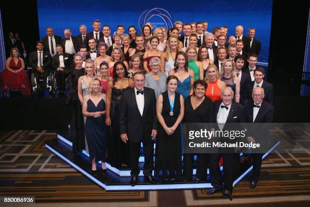 John Newcombe medallist Ashleigh Barty pose with other tennis players and officials at the 2017 Newcombe Medal at Crown Palladium on November 27,...