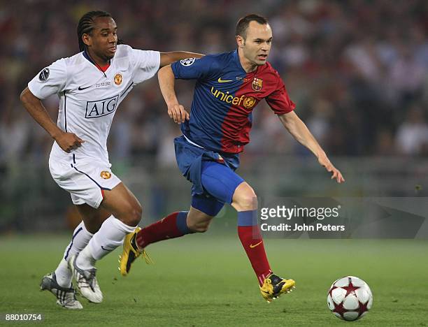 Anderson of Manchester United clashes with Andres Iniesta of Barcelona during the UEFA Champions League Final between FC Barcelona and Manchester...
