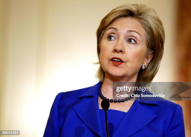 Secretary of State Hillary Clinton talks to reporters after a working lunch with Egyptian Foreign Affairs Minister Ahmed Ali Aboul Gheit at the State...