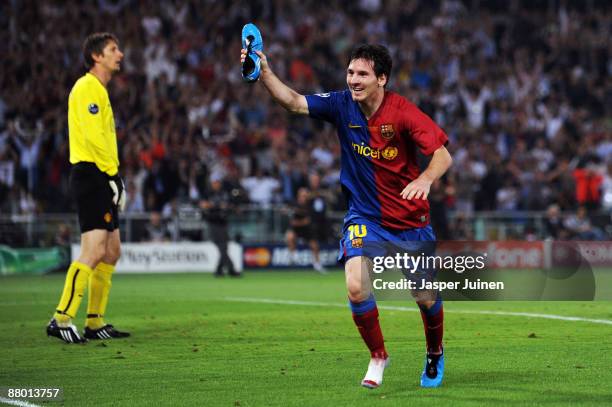 Lionel Messi of Barcelona celebrates scoring the second goal for Barcelona during the UEFA Champions League Final match between Barcelona and...