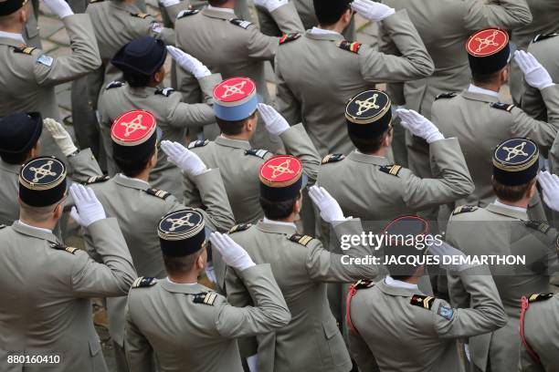 Officers of the French Armed Forces attend a military ceremony at the Hotel des Invalides on November 27, 2017 in Paris. / AFP PHOTO / JACQUES...