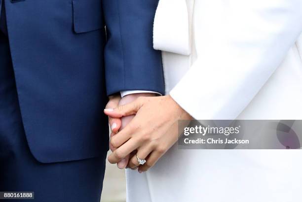 Prince Harry and actress Meghan Markle during an official photocall to announce their engagement at The Sunken Gardens at Kensington Palace on...