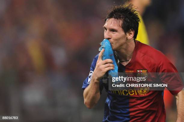 Barcelona´s Argentinian forward Lionel Messi celebrates after scoring against Manchester United during the final of the UEFA football Champions...