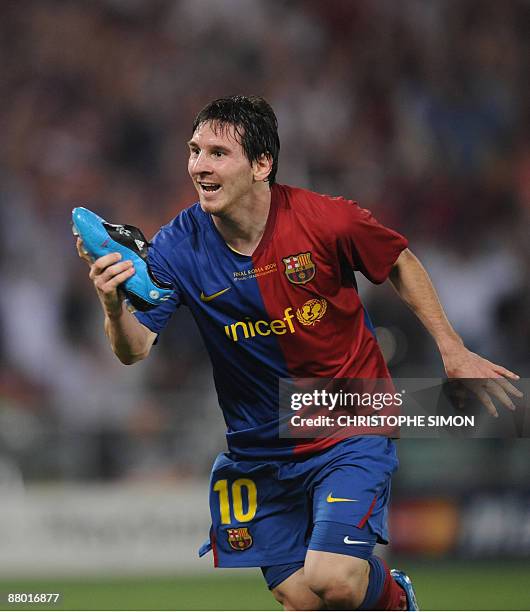 Barcelona´s Argentinian forward Lionel Messi celebrates after scoring against Manchester United during the final of the UEFA football Champions...