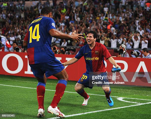 Lionel Messi of Barcelona celebrates with his team mate Thierry Henry after Messi scored the second goal for Barcelona during the UEFA Champions...