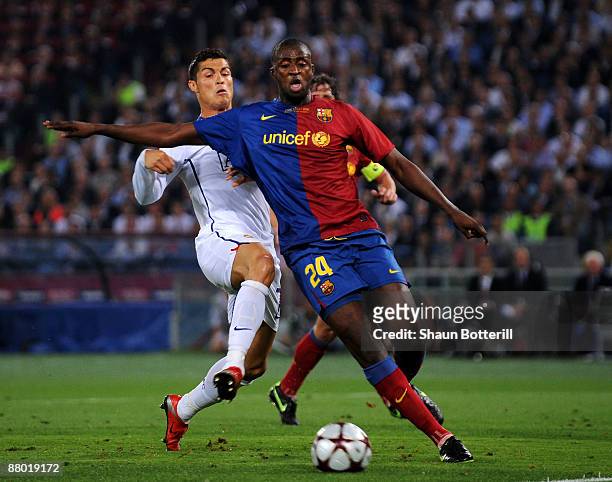 Cristiano Ronaldo of Manchester United battles for the ball with Yaya Toure of Barcelona during the Champions League Final match between Barcelona...