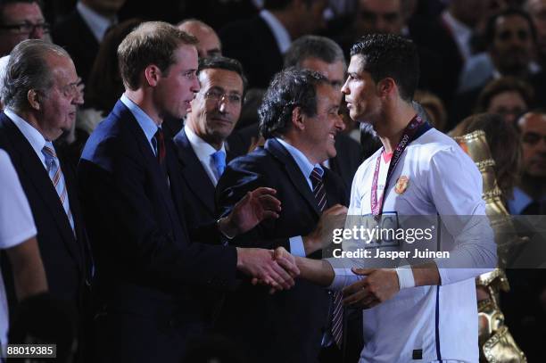 Britain's Prince William speaks to Cristiano Ronaldo of Manchester United after the UEFA Champions League Final match between Barcelona and...