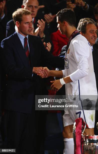 Britain's Prince William speaks to Cristiano Ronaldo of Manchester United after the UEFA Champions League Final match between Barcelona and...