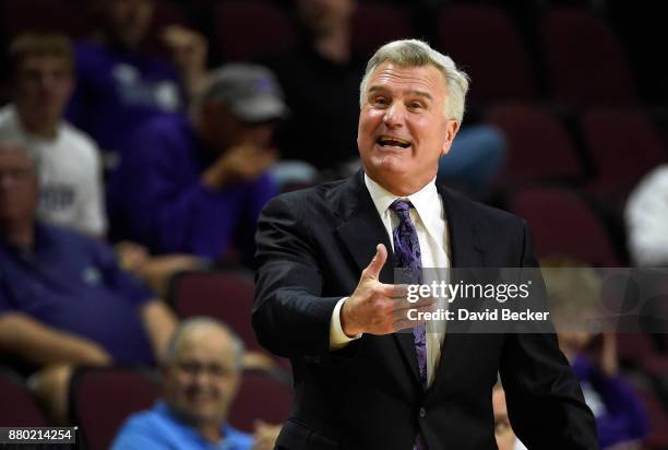 Head coach Bruce Weber of the Kansas State Wildcats gestures while calling to his team against the George Washington Colonials during the 2017...