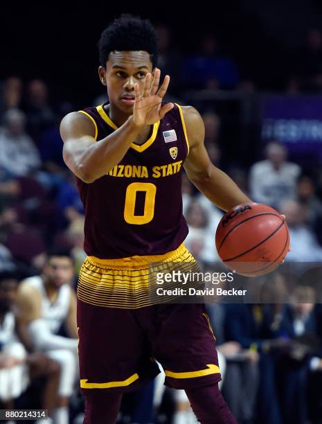 Tra Holder of the Arizona State Sun Devils signals his team during the championship game of the 2017 Continental Tire Las Vegas Invitational...