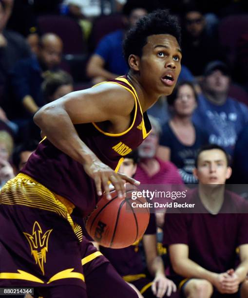 Tra Holder of the Arizona State Sun Devils carries the ball during the championship game of the 2017 Continental Tire Las Vegas Invitational...