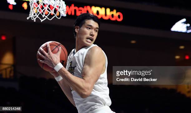 Yuta Watanabe of the George Washington Colonials grabs a rebound against the Kansas State Wildcats during the 2017 Continental Tire Las Vegas...