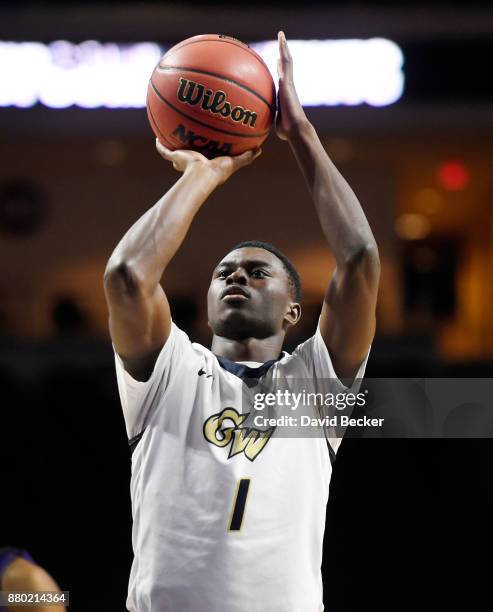 Terry Nolan Jr. #1 of the George Washington Colonials shoots a free through against the Kansas State Wildcats during the 2017 Continental Tire Las...