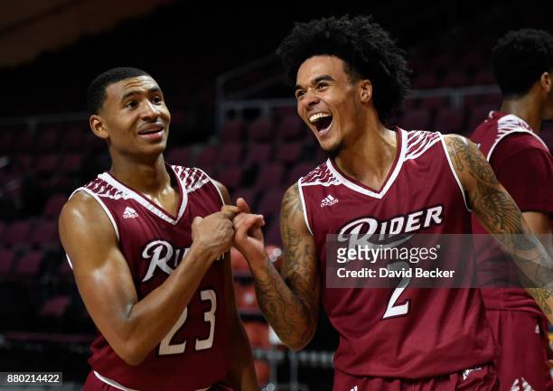 Stevie Jordan and Jordan Allen of the Rider Broncs celebrate after the team defeated the Hampton Pirates during the championship game of the 2017...