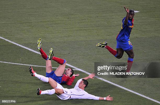 Barcelona's forward Yaya Toure runs as Manchester's forward Cristiano Ronaldo lies on the pitch during the UEFA football Champions League final match...