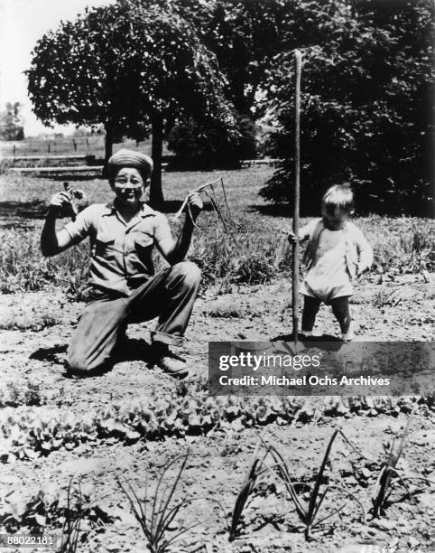 Actor James Dean mugs for the camera with his cousin on his Uncle and Aunt's farm circa 1944 in Fairmount, Indiana.
