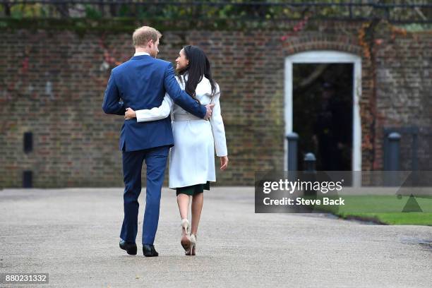 Prince Harry and actress Meghan Markle attend an official photocall to announce their engagement at The Sunken Gardens at Kensington Palace on...