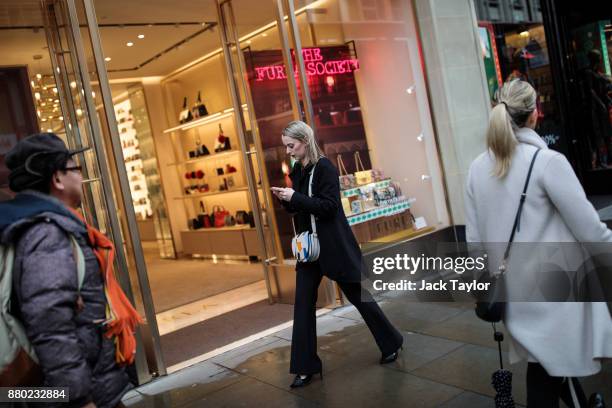 People walk past designer shops on Brompton Road on November 27, 2017 in London, England. The American actress Meghan Markle will live at Nottingham...