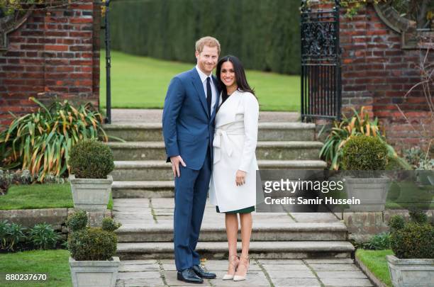 Prince Harry and Meghan Markle during an official photocall to announce the engagement of Prince Harry and actress Meghan Markle at The Sunken...