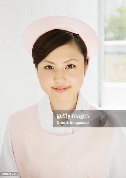 a nurse - nurse hat stock pictures, royalty-free photos & images