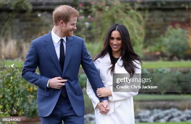 Prince Harry and Meghan Markle during an official photocall to announce the engagement of Prince Harry and actress Meghan Markle at The Sunken...