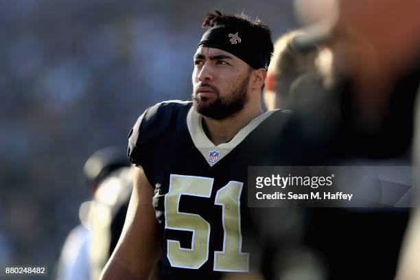Manti Te'o of the New Orleans Saints looks on from the sideline during the second half of a game against the Los Angeles Rams at Los Angeles Memorial...