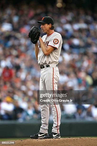 Randy Johnson of the San Francisco Giants pitches during the game against the Seattle Mariners on May 22, 2009 in Seattle, Washington. The Mariners...