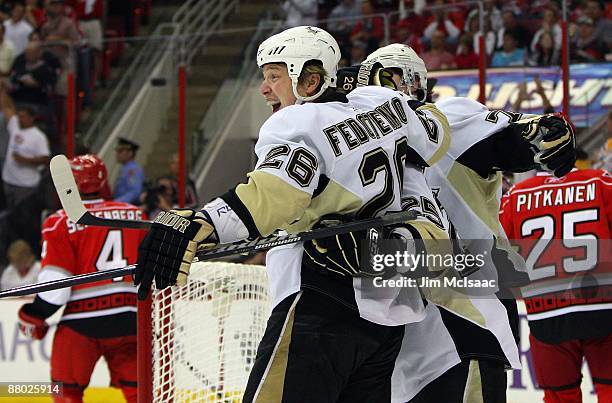 Ruslan Fedotenko of the Pittsburgh Penguins celebrates his goal against the Carolina Hurricanes during Game Four of the Eastern Conference...