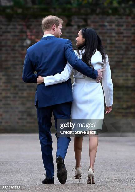 Prince Harry and actress Meghan Markle attend an official photocall to announce their engagement at The Sunken Gardens at Kensington Palace on...