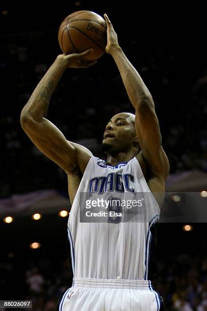 Rashard Lewis of the Orlando Magic shoots a three-pointer against the Cleveland Cavaliers in Game Four of the Eastern Conference Finals during the...