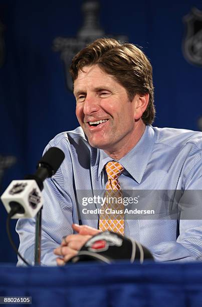 Head coach Mike Babcock of the Detroit Red Wings answers questions from the media at a press conference after their 2-1 overtime win against the...