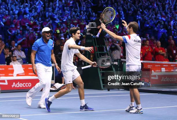 Captain of France Yannick Noah, Pierre-Hughes Herbert, Richard Gasquet celebrate the victory following the doubles match on day 2 of the Davis Cup...