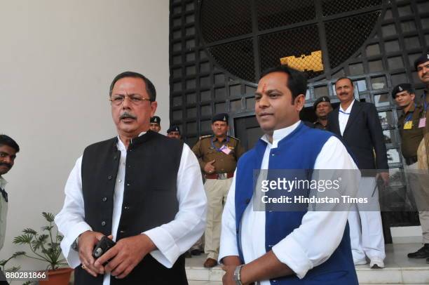 Newly elected Congress MLA from Chitrakoot coming to MP state Assembly with leader of opposition Ajay Singh on the first day of winter session on...
