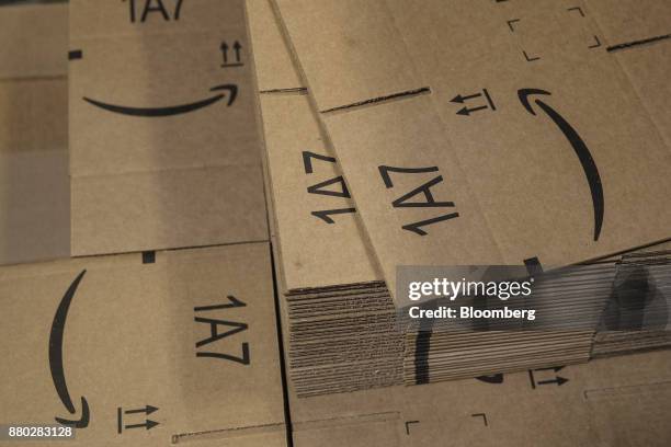 Flattened boxes sit stacked at the Amazon.com Inc. Fulfillment center in Robbinsville, New Jersey, U.S., on Monday, Nov. 27, 2017. The holiday...