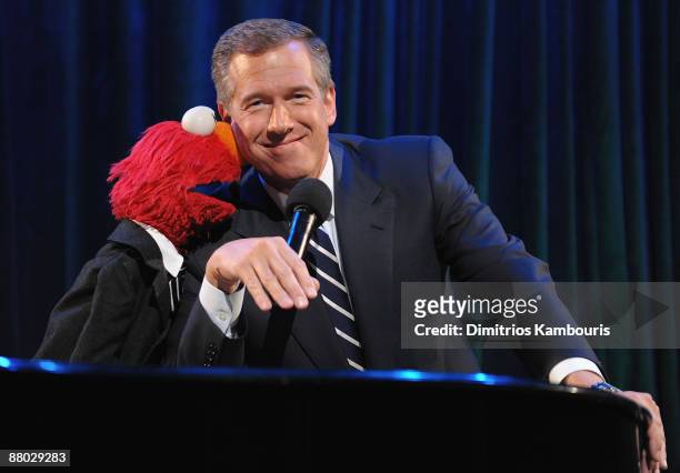 Elmo and Brian Williams attend Sesame Workshop's 7th annual benefit gala at Cipriani 42nd Street on May 27, 2009 in New York City.