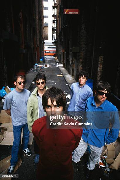 English rock group Oasis, 2nd August 1994. From left to right, rhythm guitarist Paul 'Bonehead' Arthurs, bassist Paul McGuigan, singer Liam...