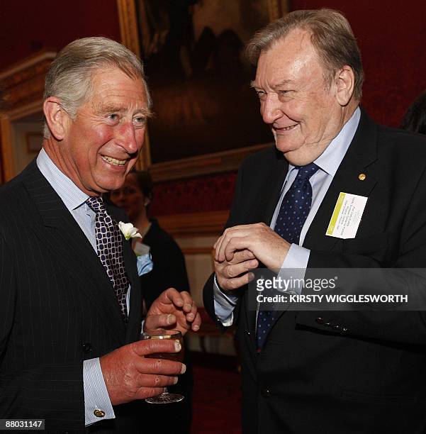 Britain's Prince Charles talks with 1984 laureate of the Nobel Prize in Physics Professor Carlo Rubbia during a reception for Nobel Laureates and...
