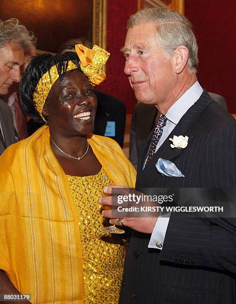 Britain's Prince Charles talks with 2004 laureate of the Peace Nobel Prize Kenya's Professor Wangari Maathai during a reception for Nobel Laureates...