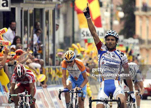 Italy's Michele Scarponi celebrates as he crosses the finish line to win the eightteenth stage of 92nd Giro of Italy between Sulmona and Benevento on...