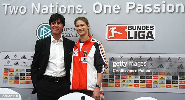 Headcoach Joachim Loew and Fencing olympic champion Britta Heidemann attend the German National Team press conference at the Portman Ritz-Carlton...