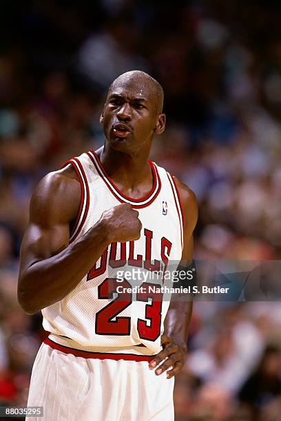 Michael Jordan of the Chicago Bulls pumps his fist in Game Four of the Eastern Conference Semifinals during the 1995 NBA Playoffs against the Chicago...