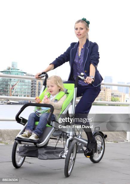 Laura Bailey with child model attends photocall to launch a new design from Dutch brand Taga at Design Museum on May 6, 2009 in London, England.