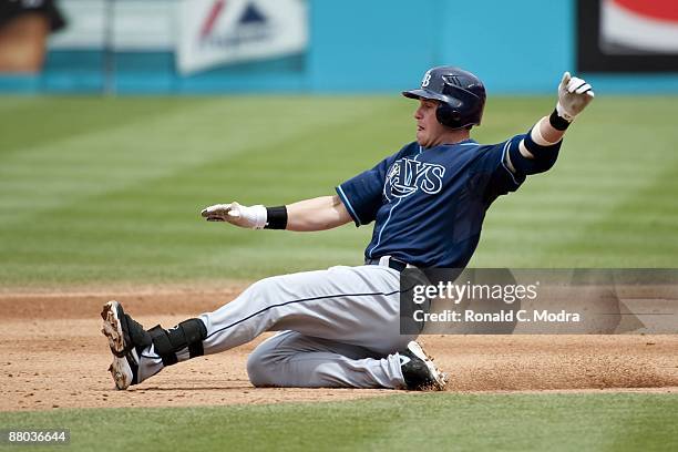 Evan Longoria of the Tampa Bay Rays slides into second base during a game against the Florida Marlins at LandShark Stadium on May 24. 2009 in Miami,...