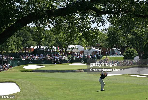 Paul Casey of England hits his second shot on the 9th hole during the first round of the Crowne Plaza Invitational at Colonial Country Club on May...