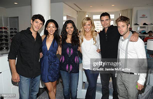 Actors Michael Rady, Stephanie Jacobsen, Jessica Lucas, Katie Cassidy, Colin Egglesfield and Shaun Sipos pose at the Lia Sophia Upfront Suite at The...