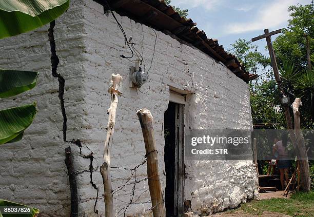 View of a house partially damaged by the earthqauke which hit the region in Ilama, Santa Barbara, west Honduras on May 28, 2009. A powerful...
