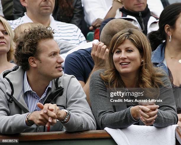 Mirka Vavrinec attends the second round match between Switzerland's Roger Federer and Argentina's Jose Acasuso at the French Open tennis tournament...
