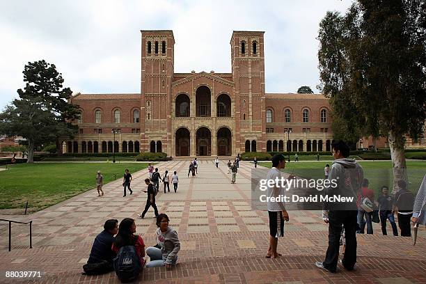 Students go about their business at University of California, Los Angeles as the prospect of billions of dollars in cuts looms for California after...